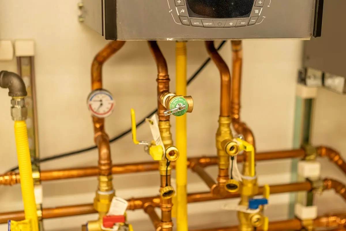 Licensed technician providing Water Heater Installation for a homeowner in Henrietta